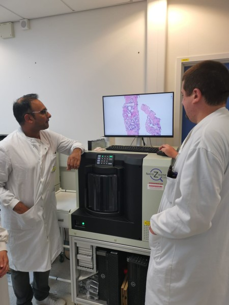 Pathology team at Oldham looking at a digitised image of a biopsy.jpg